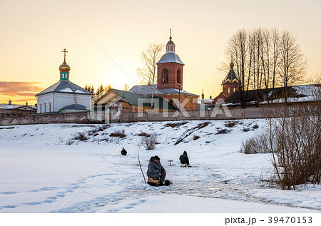 Fishermen in winter fishing near the walls  39470153