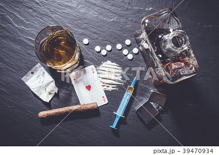 Overhead shot of hard drugs on gray stone table 39470934