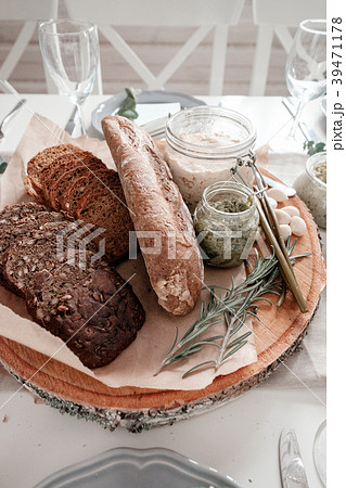 Sliced bread and sauces on the table 39471178