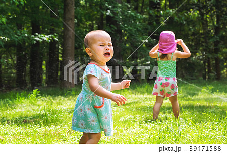 Upset toddler girl crying Upset toddler girl crying 39471588