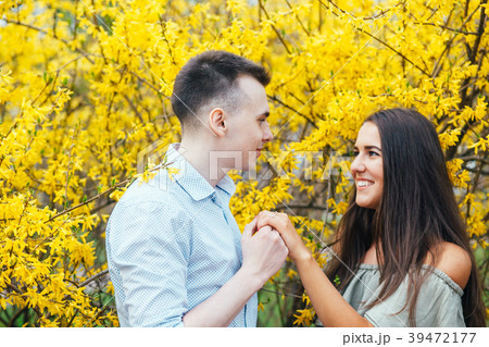 Young happy couple in love outdoors. Man and woman 39472177