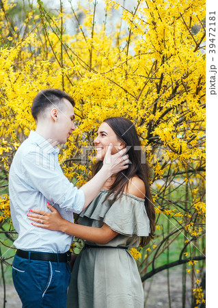 Young happy couple in love outdoors. Man and woman Young happy couple in love outdoors. Man and woman 39472181