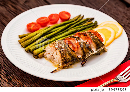 Roasted zander fillet with asparagus and lemon Roasted zander fillet with asparagus and lemon 39473343