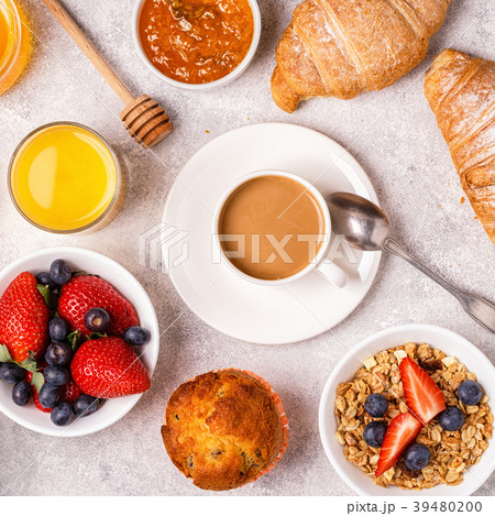 Continental breakfast with fresh croissants Continental breakfast with fresh croissants 39480200