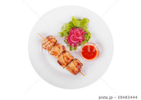 Shish kebab with sauce isolated without garnish 39483444