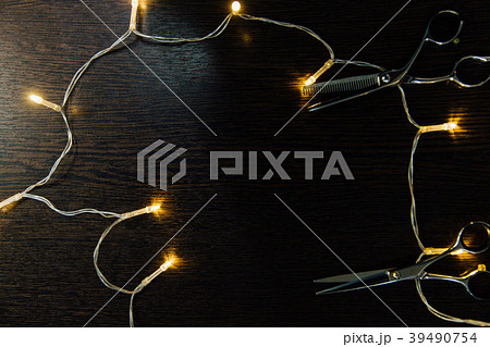 Professional hairdresser stylist scissors and a Professional hairdresser stylist scissors and a 39490754