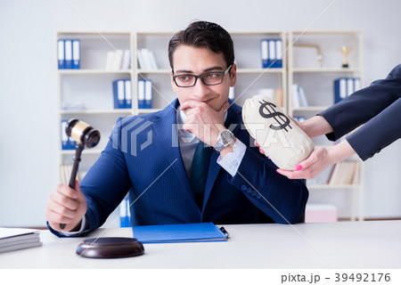 Judge in bribe concept with money Judge in bribe concept with money 39492176