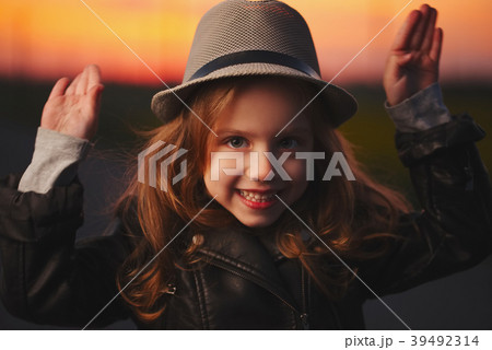 beautiful girl with hat on evening sunset 39492314