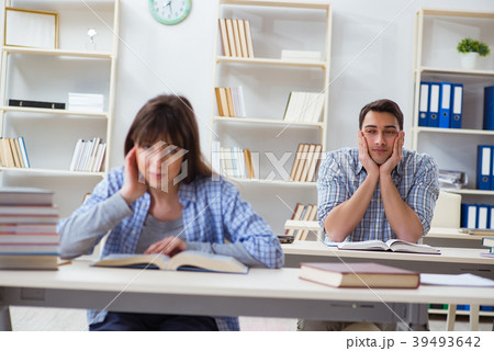Students sitting and studying in classroom college 39493642