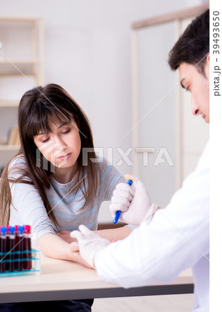 Patient during blood test sampling procedure taken 39493650