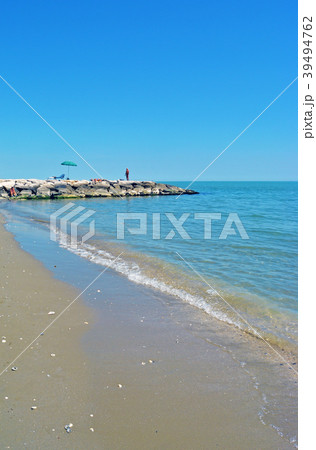 Pier on sand beach at sunny summer day 39494762
