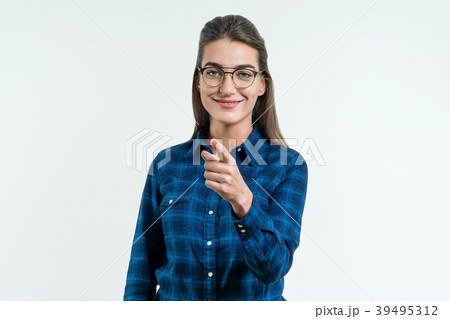 Portrait of cheerful young girl with crossed arms. 39495312