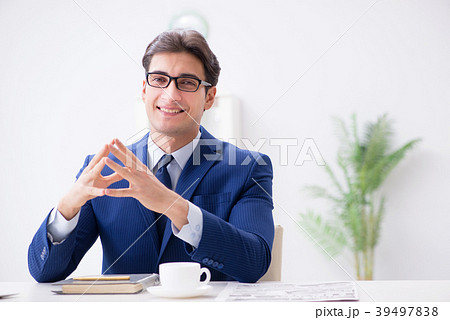 Young handsome businessman employee working in Young handsome businessman employee working in 39497838