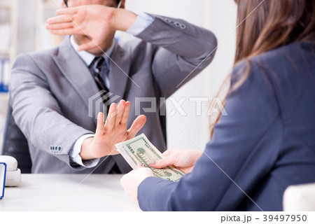 Businessmanbeing offered bribe for breaking law 39497950