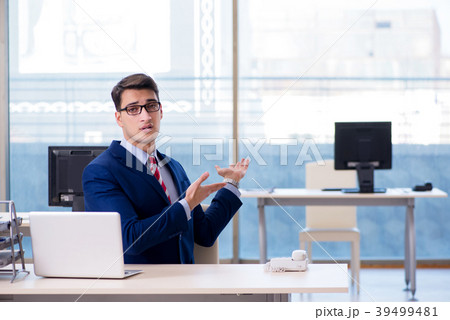 Businessman employee unhappy about absent employee 39499481