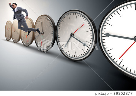 Businessman in time management concept 39502877
