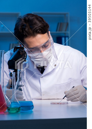 Chemistry assistant working in the chemical lab Chemistry assistant working in the chemical lab 39503144