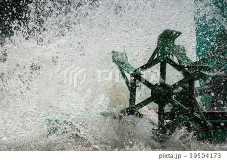 spinning turbine in the water for make some oxygen 39504173