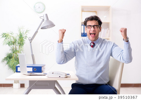 Young handsome businessman employee working in 39510367