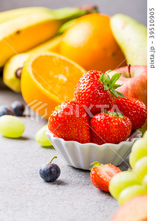 Fresh assorted fruits and berries 39510905