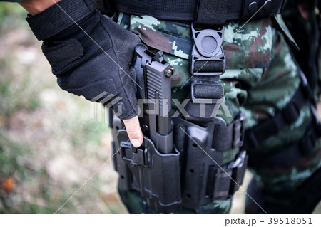 Closeup swat soldier with gun. Forces holding gun. Closeup swat soldier with gun. Forces holding gun. 39518051