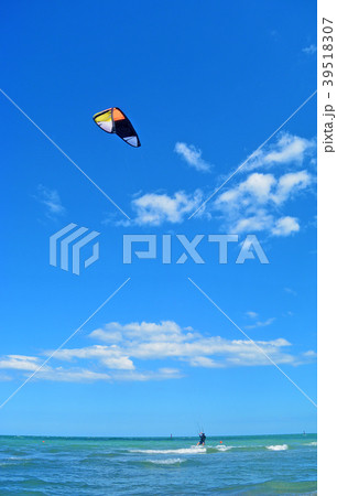 Young Man ride Kite Surf in the sea, Extreme Sport Young Man ride Kite Surf in the sea, Extreme Sport 39518307