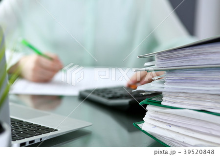 Bookkeeper or financial inspector making repor Bookkeeper or financial inspector making repor 39520848