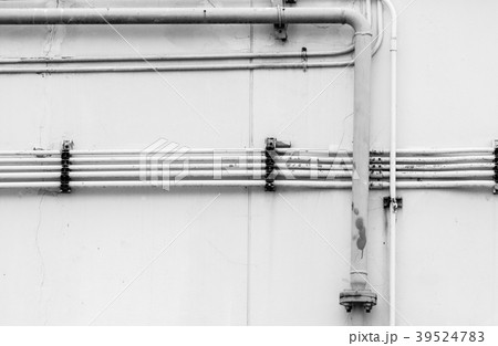 Pipeline water detail at industrial building wall 39524783