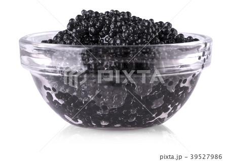Black caviar in glass bowl on white background. Black caviar in glass bowl on white background. 39527986