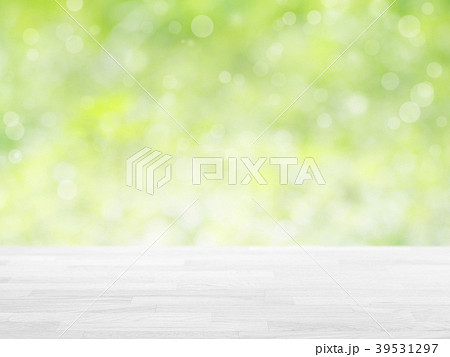 wood table top on green bokeh abstract background 39531297