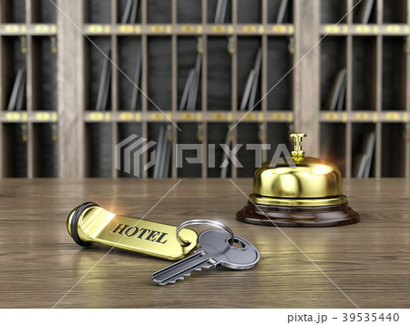 Hotel key and reception bell on reception desk 39535440