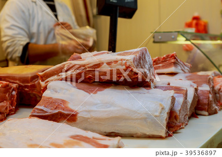 Assortment of read meat at a butcher shop 39536897