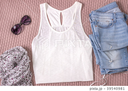 Mockup of white tank shirt with blue jeans Mockup of white tank shirt with blue jeans 39540981