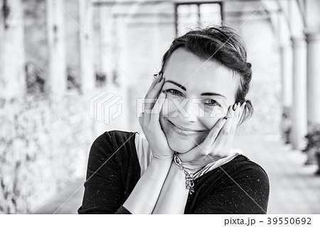 Joyful woman in medieval corridor, Telc, colorless Joyful woman in medieval corridor, Telc, colorless 39550692