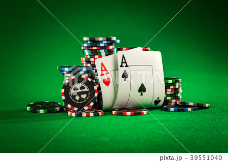Stack of chips and two aces Stack of chips and two aces 39551040