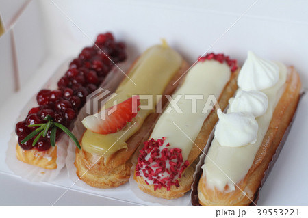 Traditional French dessert. Beautiful eclairs Traditional French dessert. Beautiful eclairs 39553221