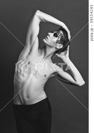 handsome young man with lace on face handsome young man with lace on face 39554295