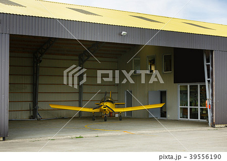 small plane standing in shed small plane standing in shed 39556190