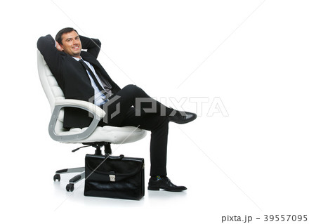 handsome businessman in suit sitting on armchair 39557095