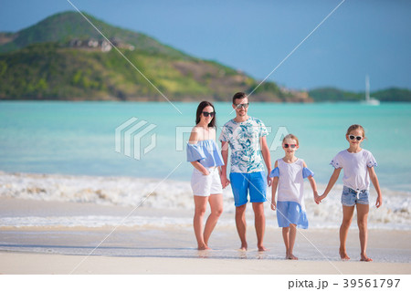 Panorama of family on beach vacation Panorama of family on beach vacation 39561797