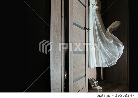 hanging on the wardrobe wedding dress 39563247