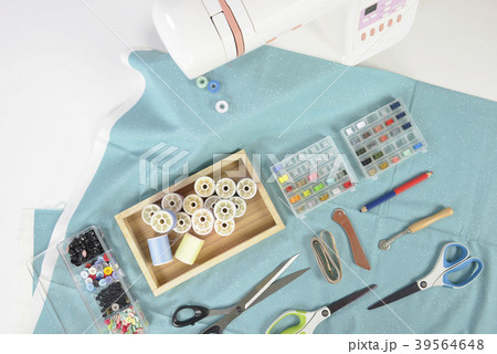 Sewing machine and colorful thread rolls. Sewing machine and colorful thread rolls. 39564648
