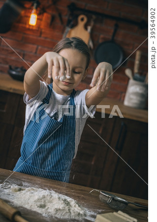 Girl cooking with flour 39564902