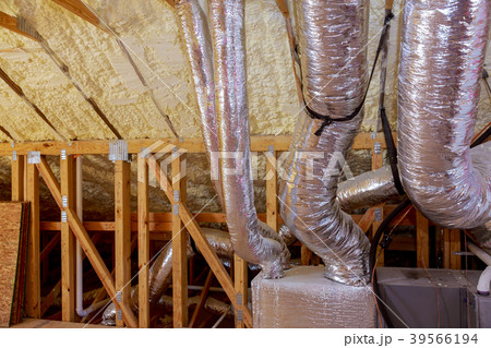 Framework showing HVAC vents being installed. 39566194