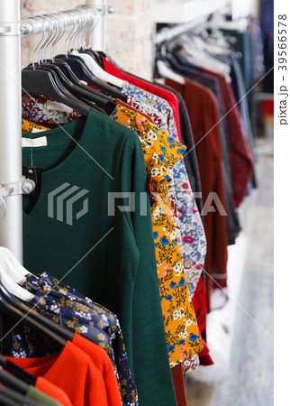colored clothes in the shopping centre colored clothes in the shopping centre 39566578