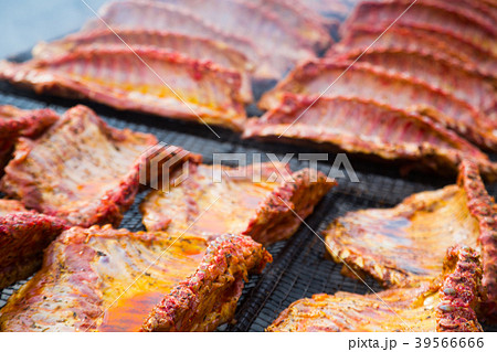 pork ribs preparing on grill brazier 39566666