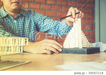Architect or engineer working in office blueprint Architect or engineer working in office blueprint 39567218