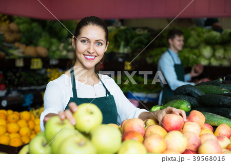 Stuff in apron selling apples Stuff in apron selling apples 39568016