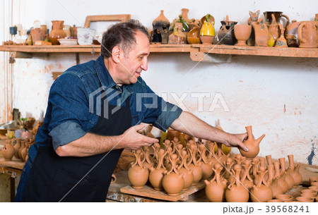 Happy potter at the workshop Happy potter at the workshop 39568241