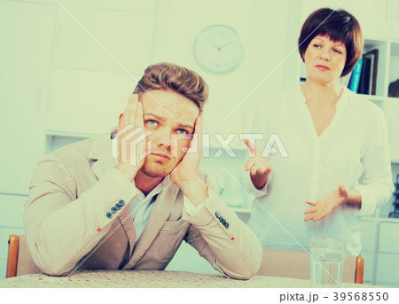 Mother calms the son Mother calms the son 39568550